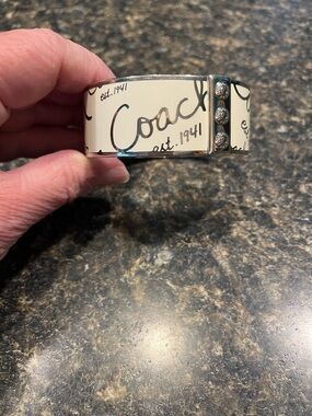 Coach Signature Hinged Bangle Bracelet in a Silver-Tone Metal with 1” Wide Band